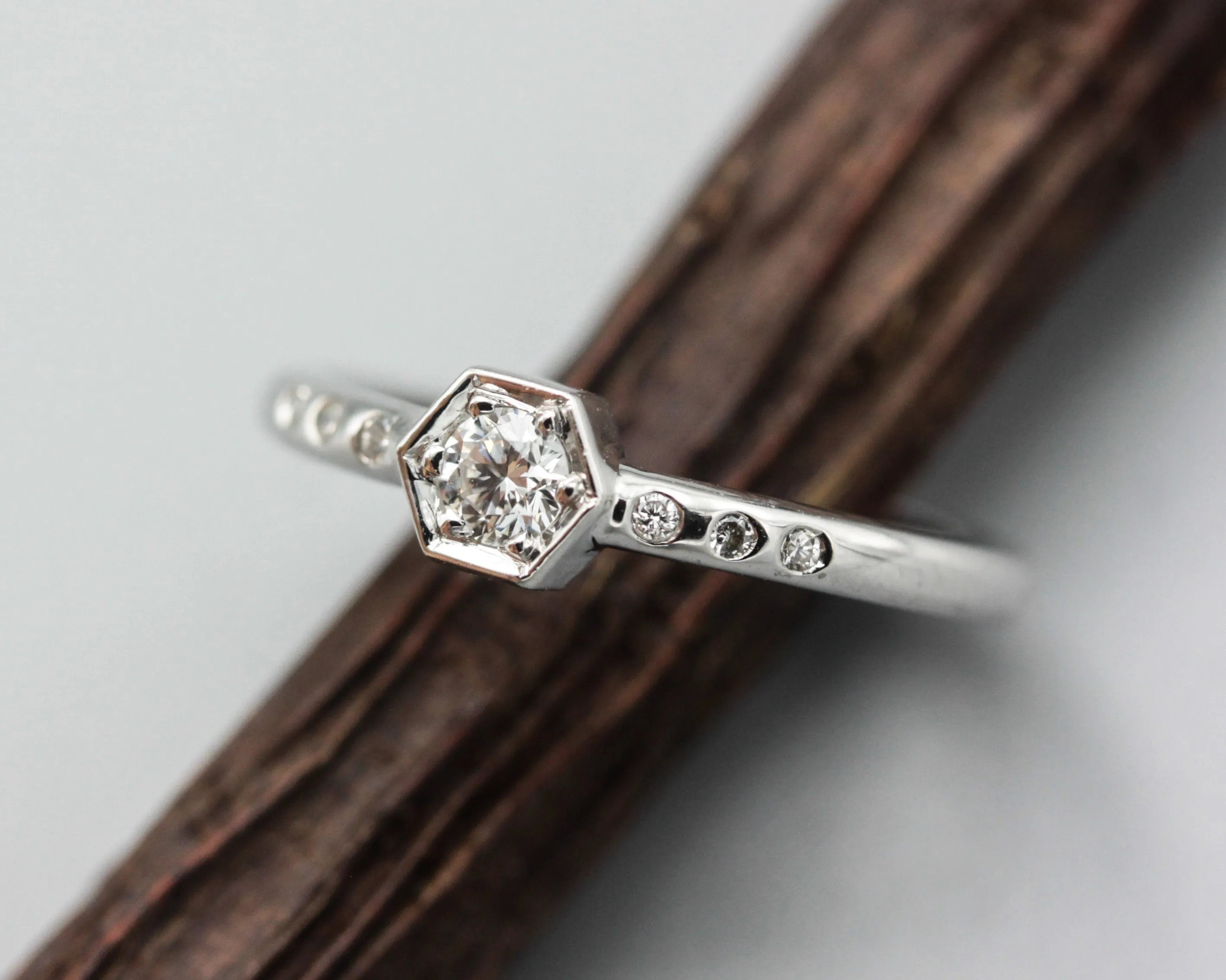 Diamond hexagon shape wedding ring with white gold round band