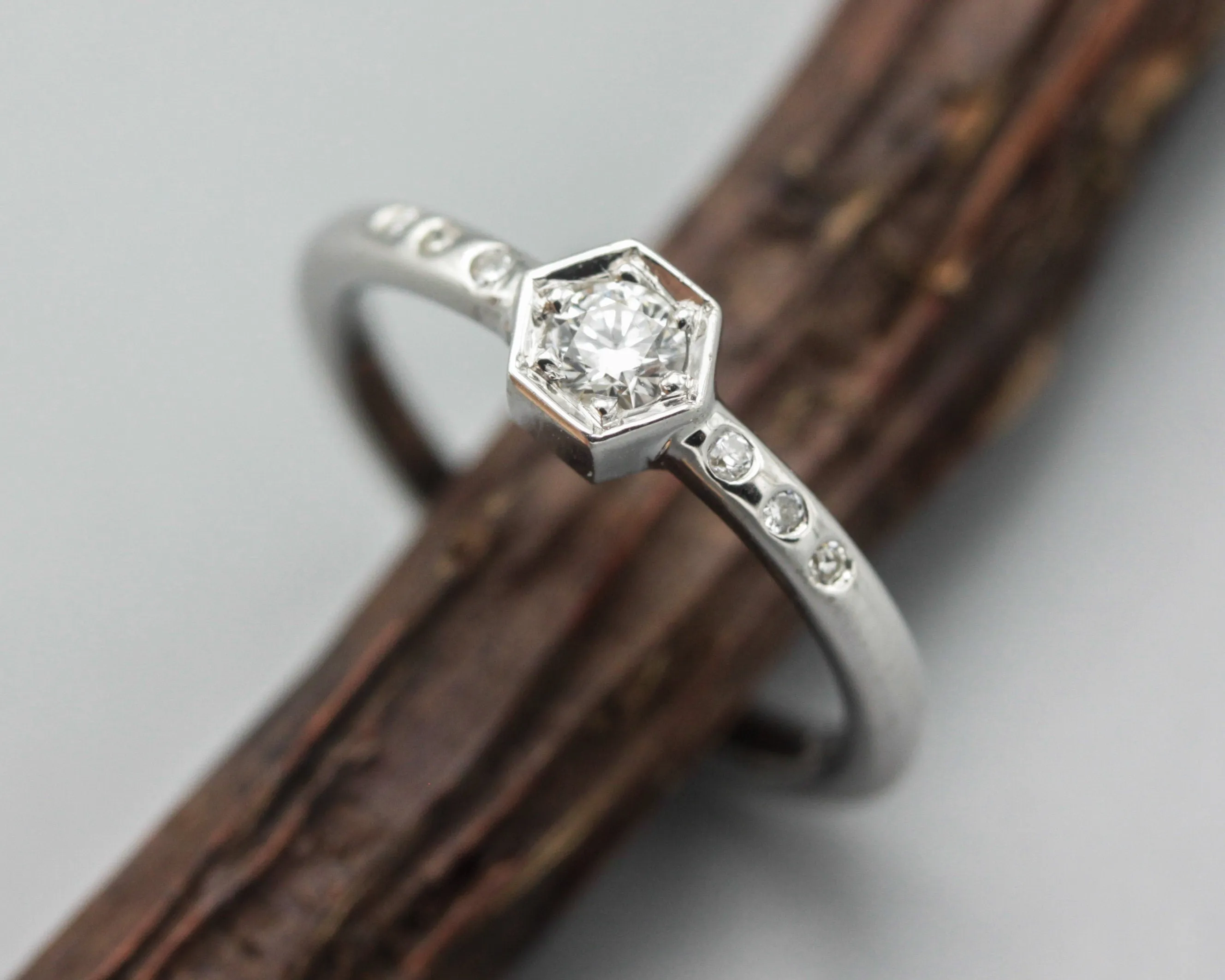 Diamond hexagon shape wedding ring with white gold round band