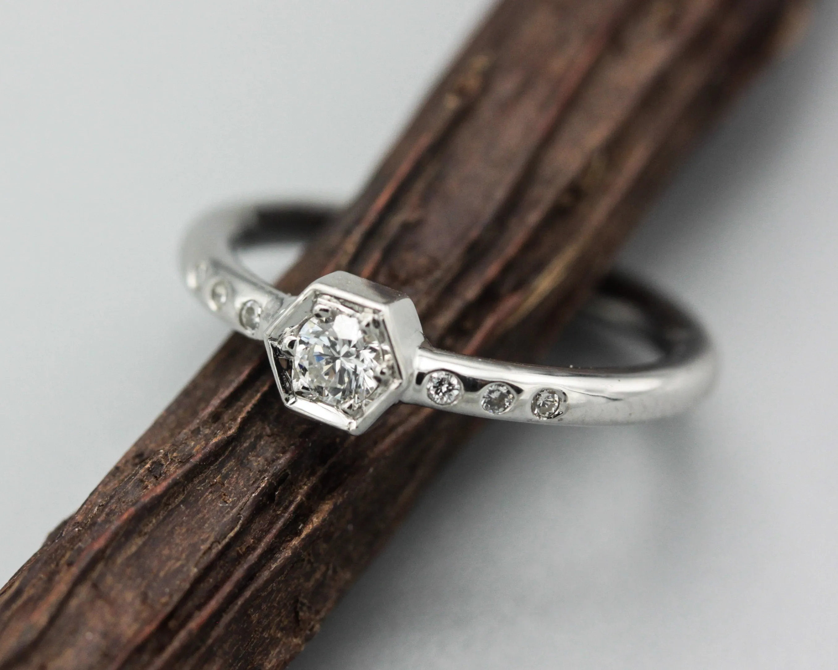 Diamond hexagon shape wedding ring with white gold round band