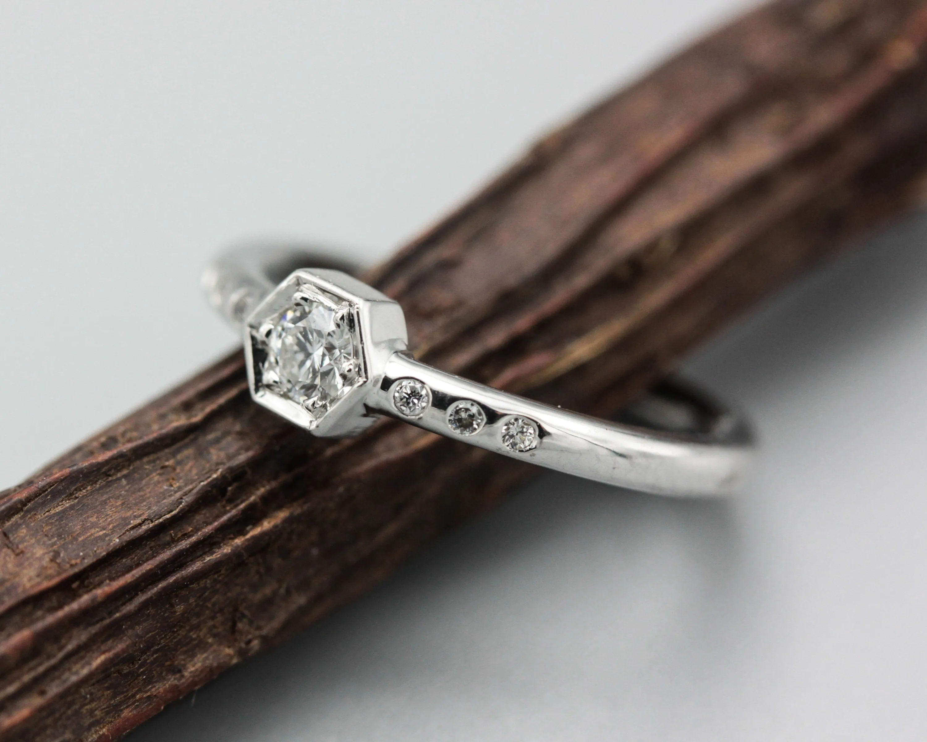 Diamond hexagon shape wedding ring with white gold round band